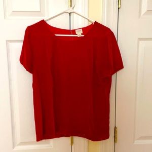 Used women’s, size small, velvet shirt. Red